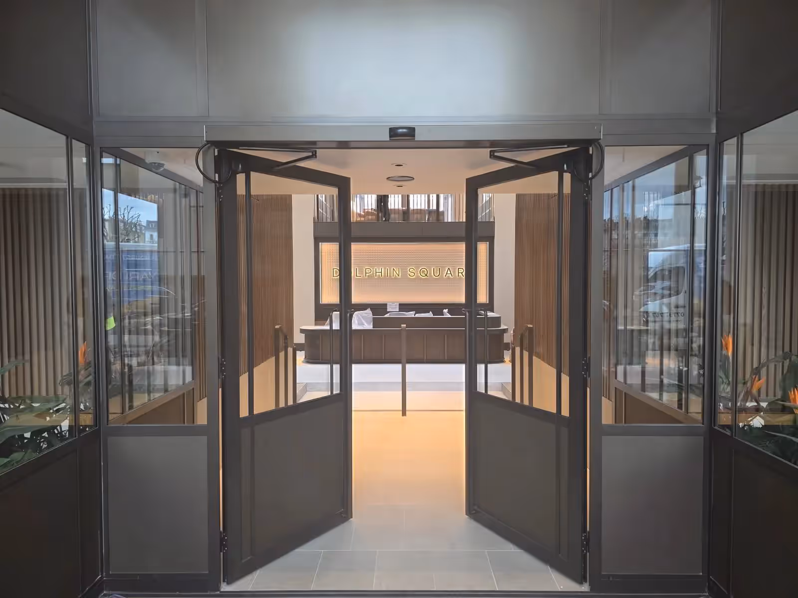Automatic commercial swing-door equipment representative of Avanti's documented EC1 automation project