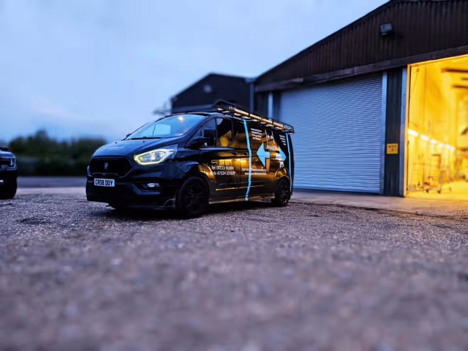 Avanti Doors engineer van at a commercial installation
