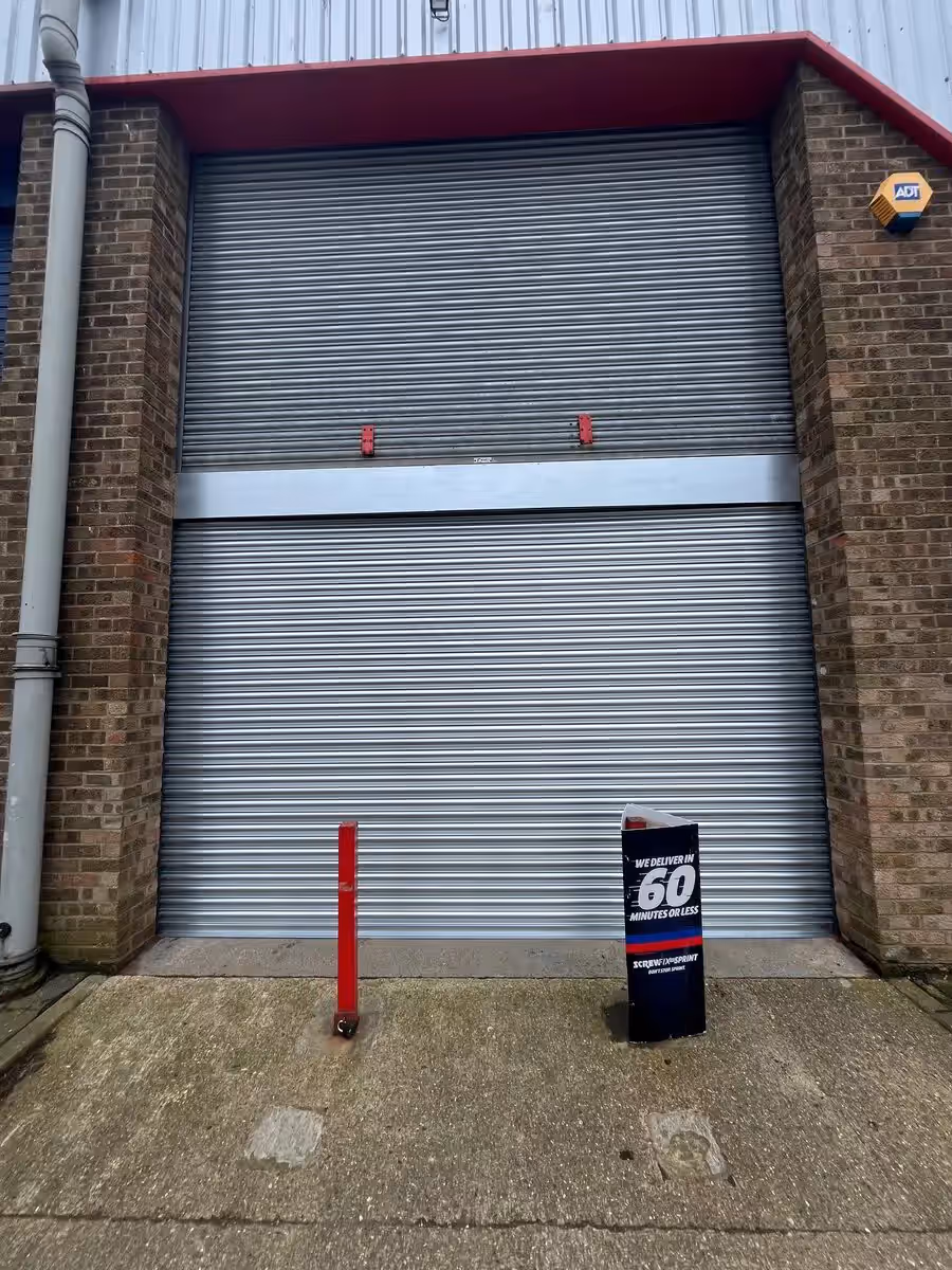 Commercial roller shutter photographed for Avanti's documented Central London replacement project