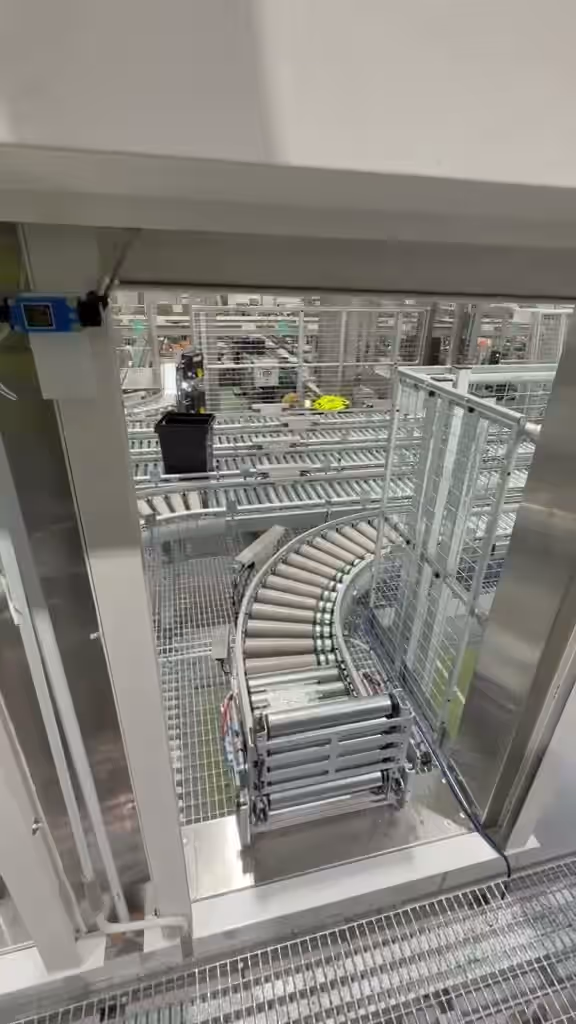 Fire shutter closing over a conveyor line